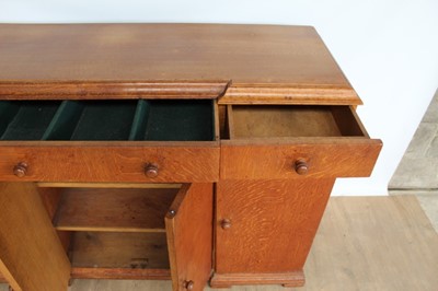 Lot 1443 - Suite of 1930s oak furniture in the manner of Heals, including refectory style table and sideboard