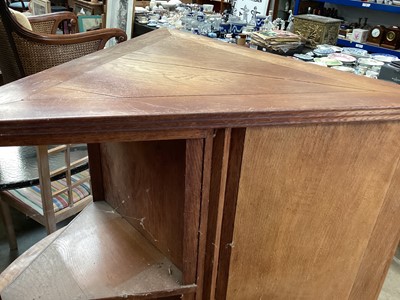 Lot 1031 - 1930s oak corner bookcase