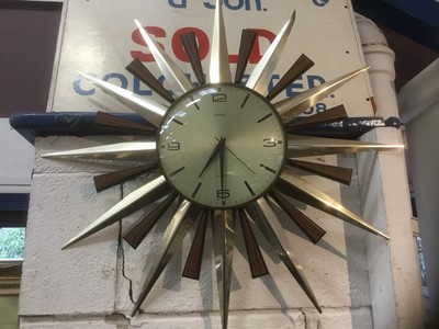 Lot 477 - Vintage starburst clock and a barometer