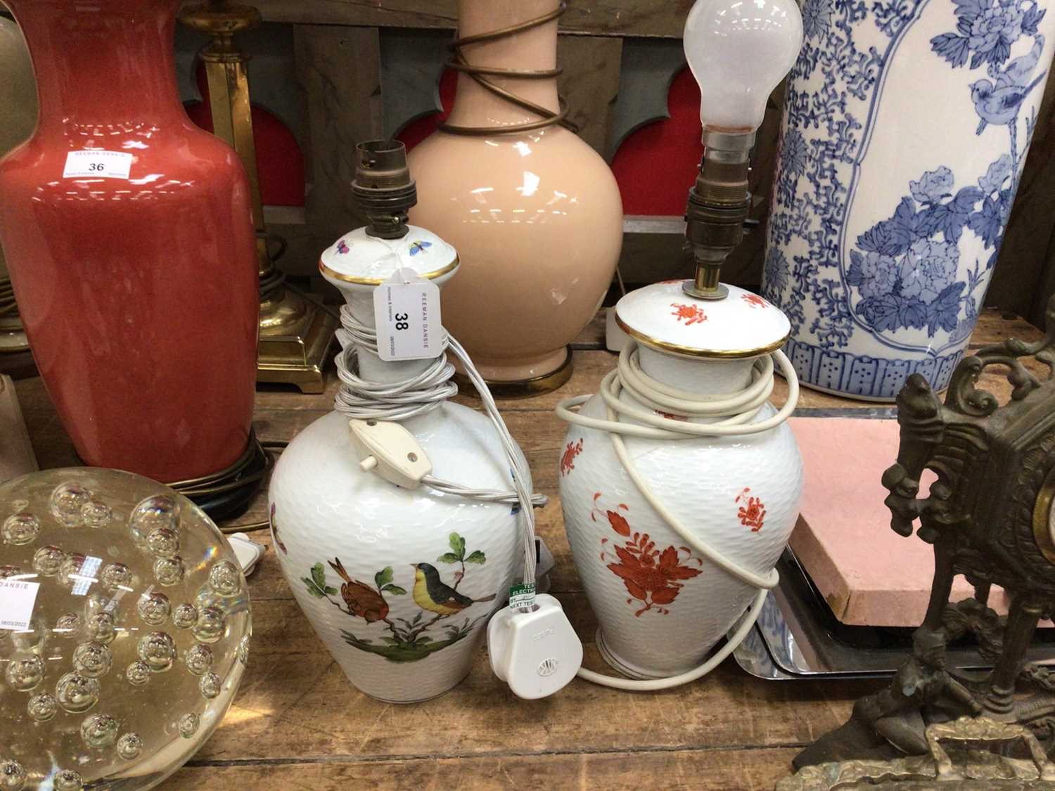 Lot 38 - Herend porcelain table lamp with hand painted bird and butterfly decoration, together with another Herend table lamp (a/f)