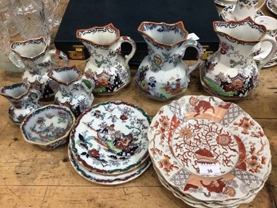 Lot 30 - Six graduated Mason's ironstone jugs, three similar plates and a bowl and four other matching dishes