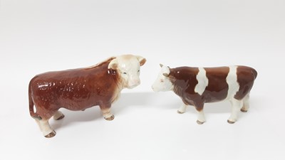 Lot 113 - Large Melba Ware Bull, 16.5cm high, together with a Goebel Bull, 13.5cm high (2)