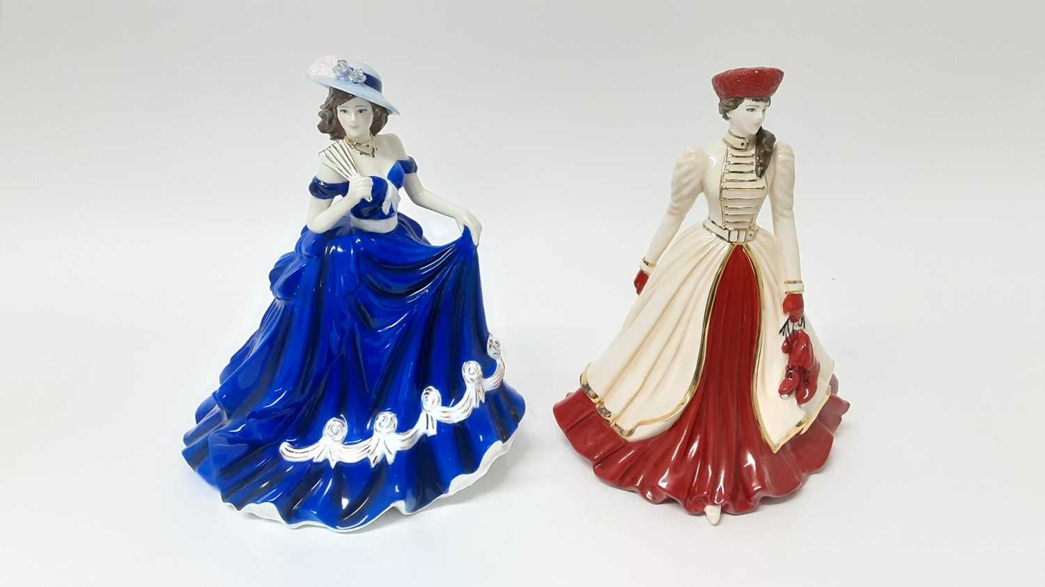 Lot 115 - Coalport Classic Elegance limited edition figure - Afternoon Stroll, together with another Coalport limited edition figure - Merry Christmas 2010 (2)