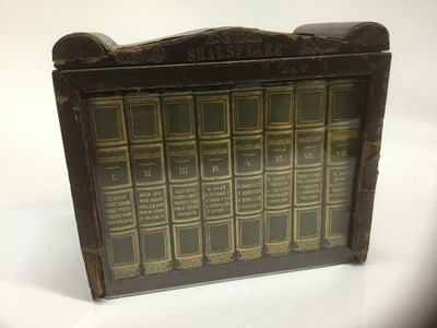 Lot 1740 - Miniature bookcase glazed, with complete works of Shakespeare published by Charles Tilt. C.1830