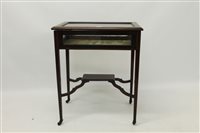 Lot 1463 - Edwardian inlaid mahogany display table with...