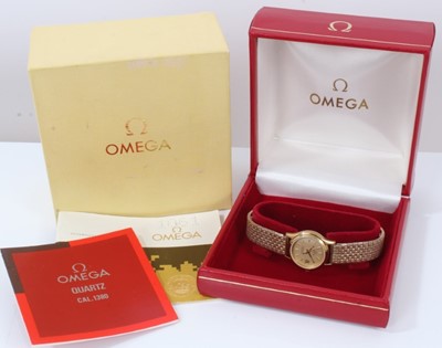 Lot 247 - 1980s ladies Omega Seamaster gold plated quartz wristwatch in original box