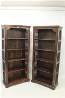 Lot 1466 - Pair hardwood open Bookscases, each with five...