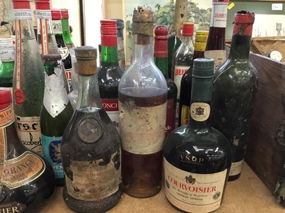 Lot 107 - Forty bottles of vintage spirits, wines and liquors to include gin, polish vodka, kirsch etc, some bottles empty for display purposes