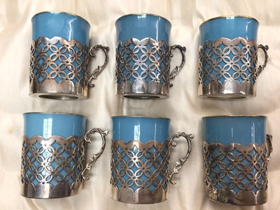 Lot 701 - Early 20th century Aynsley coffee set on turquoise ground with pierced silver cup holders (Sheffield 1917), in original fitted case (4.8ozs of silver)