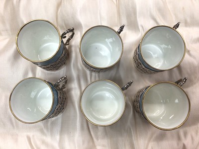 Lot 701 - Early 20th century Aynsley coffee set on turquoise ground with pierced silver cup holders (Sheffield 1917), in original fitted case (4.8ozs of silver)