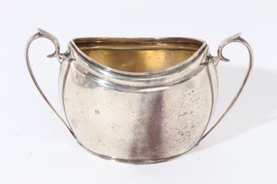 Lot 351 - Silver teapot with matching silver sugar basin and silver cream jug of oval navette form (London 1927)