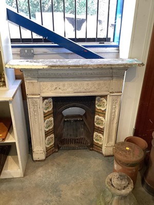 Lot 855 - Victorian cast iron fire surround with inset tiles