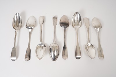 Lot 359 - Eight Georgian Irish silver fiddle pattern serving spoons of various makers and dates