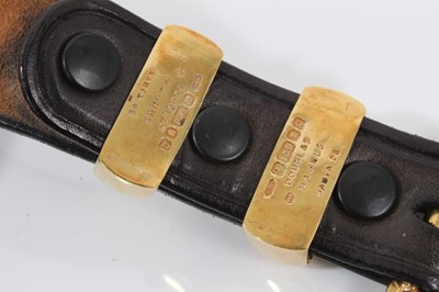 Lot 150 - Sean Whelan black leather belt mounted with 18ct gold buckle and fittings by Douglas Magnus