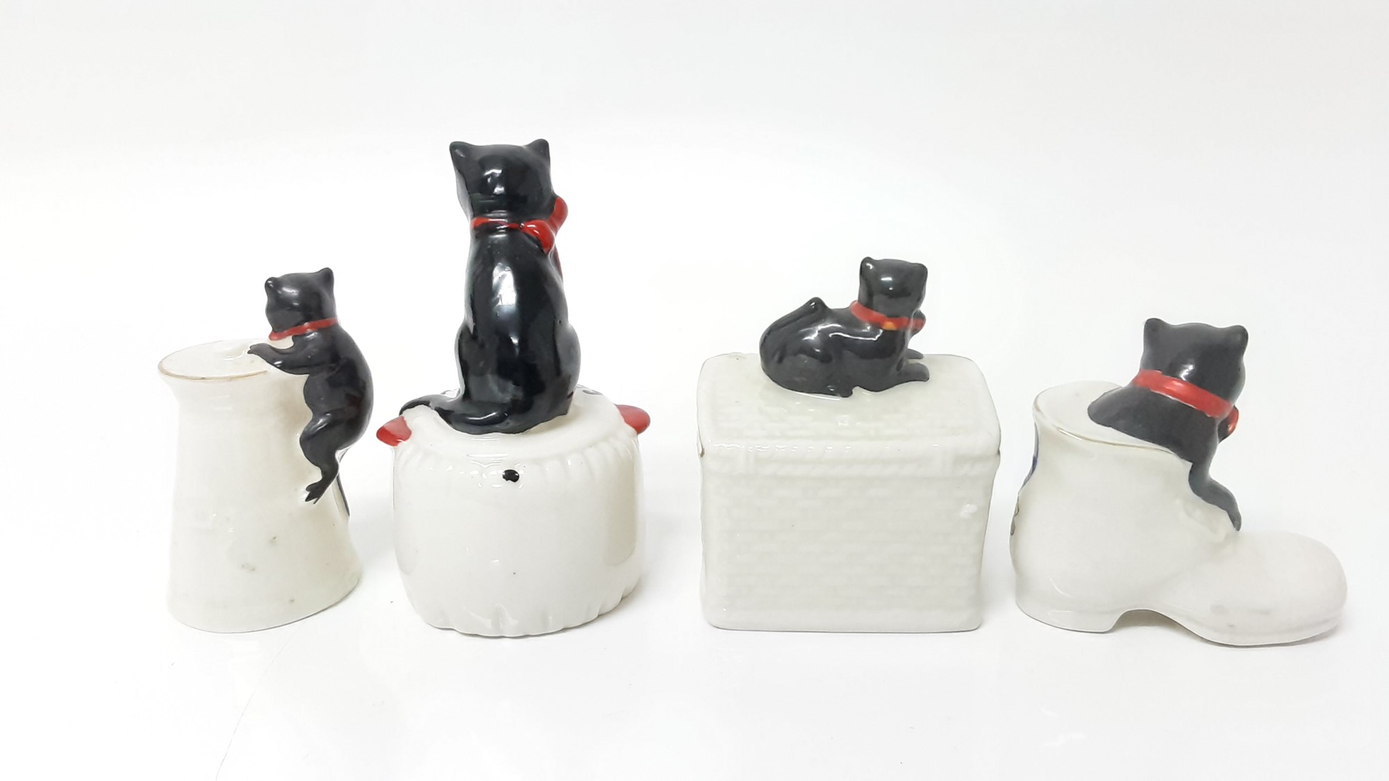 Lot 143 Four Arcadian Crested China Black Cats
