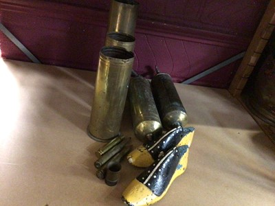 Lot 502 - Three WWI brass shell cases, two vintage brass fire extinguishers, pair of metal shoe dyes, other metal ware and vintage roulette wheel