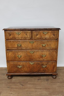 Lot 1425 - 18th century walnut chest of two short and three long drawers