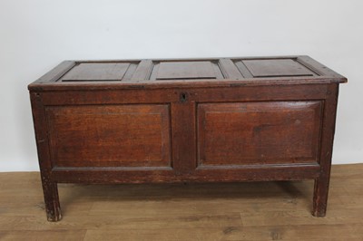 Lot 1427 - 18th century oak coffer with three panel top