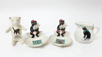 Lot 152 - Four Arcadian Crested China Black Cats including bagpipers - Barnard Castle, Alnwick, Alford and Burton Joyce