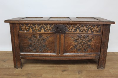 Lot 1451 - 18th century carved oak coffer