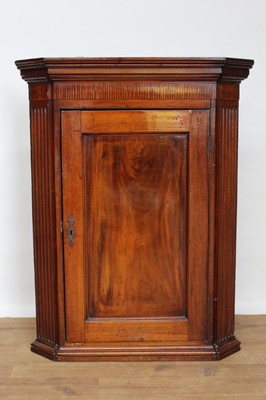 Lot 1453 - George III mahogany hanging corner cupboard