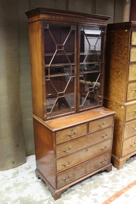 Lot 1414 - 19th century mahogany bookcase on chest