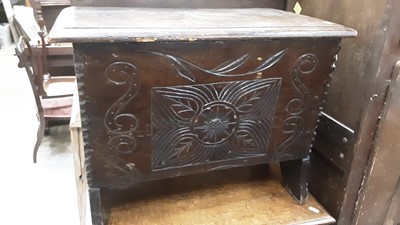 Lot 1214 - Antique oak miniature coffer with rising lid and carved front on shaped end standards