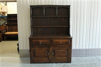 Lot 1488 - Oak high dresser, the boarded rack with...