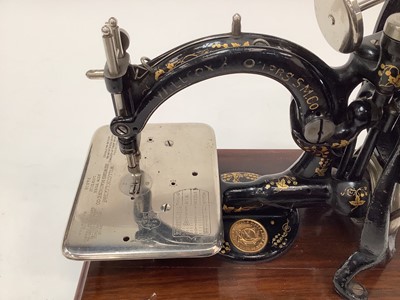 Lot 2575 - Willcox sewing machine in box
