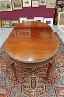 Lot 1493 - 1920s mahogany oval extending dining table...