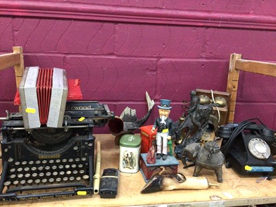 Lot 551 - Bakelite telephone, typewriter, novelty Uncle Sam money box and quantity of other items