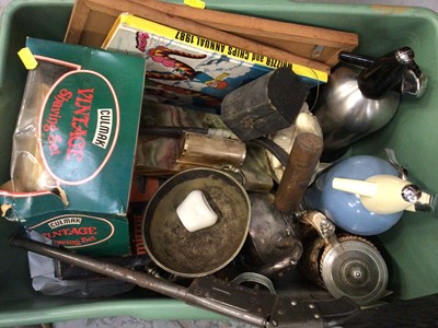 Lot 550 - Two boxes of sundry items to include vintage radios, lighters and soda siphons