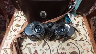Lot 66 - Three pairs of Ross binoculars in leather cases