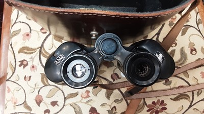 Lot 66 - Three pairs of Ross binoculars in leather cases