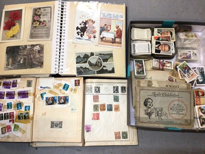 Lot 322 - Collection of cigarette cards, two stamp albums and a postcard album