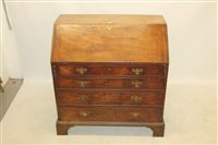 Lot 1500 - George III mahogany bureau, the sloping fall...