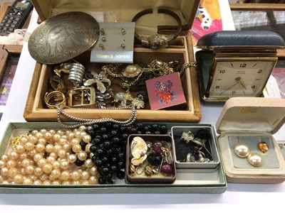 Lot 655 - Small group of costume jewellery including travel clock