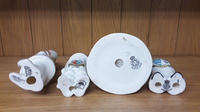 Lot 167 - Selection of Crested China models including Policeman, Boy Scout, Lighthouse etc, various manufacturers to include Carlton, Willow Art and Shelley