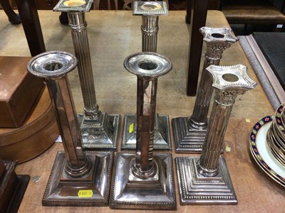 Lot 423 - Three pairs of silver plated candlesticks