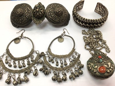 Lot 750 - 19th century Turkish white metal buckle, Eastern white metal scent flask on chain, pair Eastern earrings and white metal torque bangle