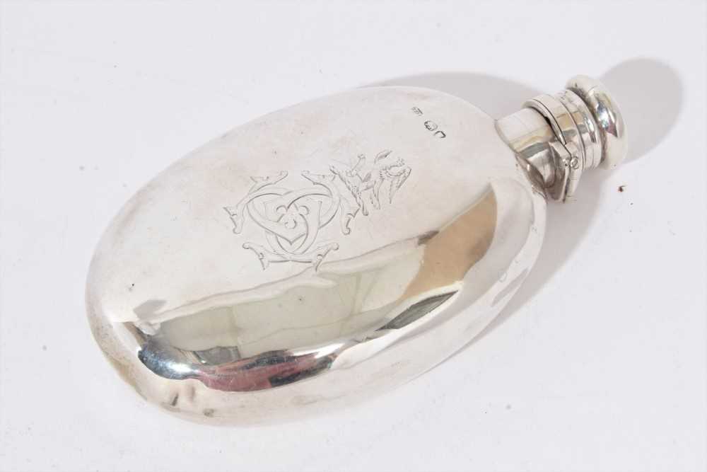 Lot 263 - Victorian silver hip flask with engraved monogram and crest, London 1873