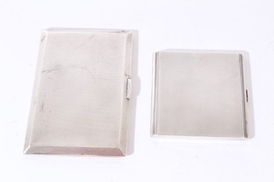 Lot 264 - Two 1930s silver engine turned cigarette cases, 10ozs