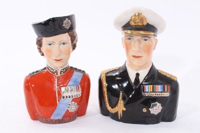 Lot 113 - Rare pair of limited edition Holkham Studio Pottery hand painted toby jugs in the form of H.M Queen Elizabeth II and The Duke of Edinburgh
