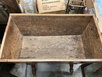 Lot 859 - 19th century elm dough trough with lid on turned legs 82 cm