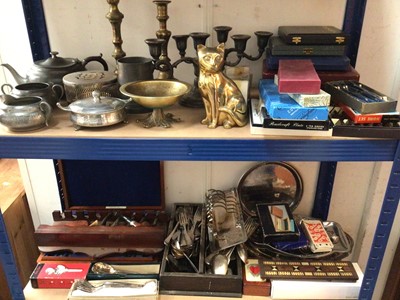 Lot 318 - Group metal and plated ware including cutlery, candlesticks, toast racks, tea ware, old tins, pipes in pipe rack and sundries