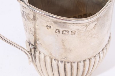 Lot 290 - Silver castor, milk jug, napkin ring