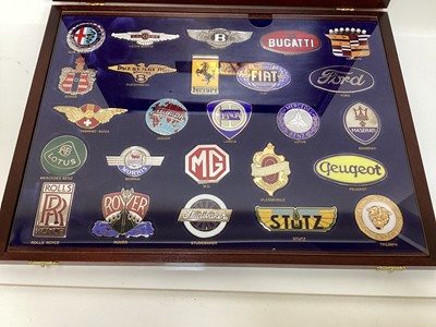 Lot 2099 - Boxed set of 25 enamel car badges- 'The badges of the world's greatest cars' in presentation box.