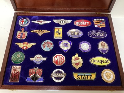 Lot 2099 - Boxed set of 25 enamel car badges- 'The badges of the world's greatest cars' in presentation box.