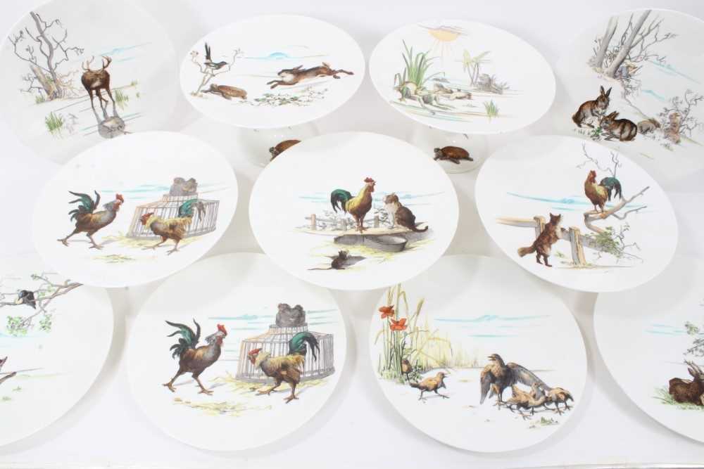 Lot 49 - Unusual dinner service decorated with scenes from Aesop's fables, including twelve plates and five comport dishes