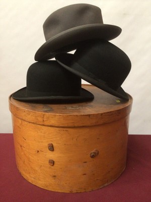 Lot 2219 - Vintage Fedora Hat Christies' London retailed by Austin Reed size & plus two black Bowler hats by G A Dunn & Co size 6 7\8 and size 7.  Sold in a large circular wooden hat box.